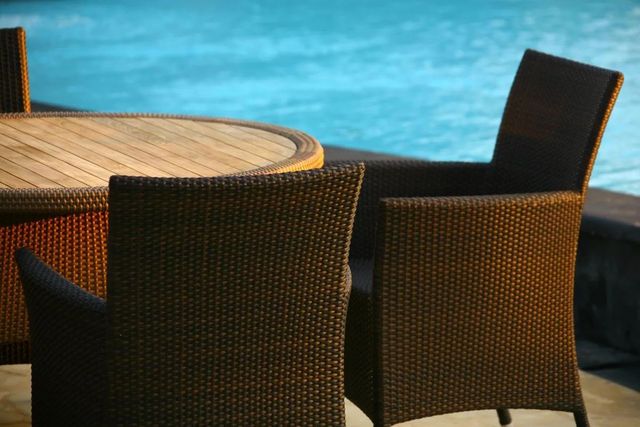  synthetic wicker armchair and round table