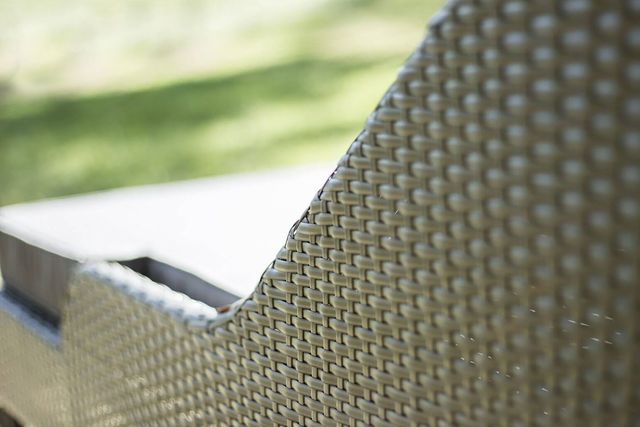 Poly strap synthetic rattan wicker in gray color at the backrest of Noble daybed