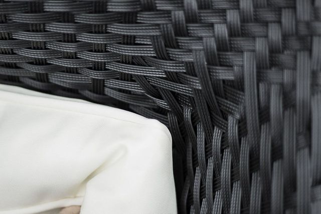 Poly strap black synthetic rattan on the corner of backrest